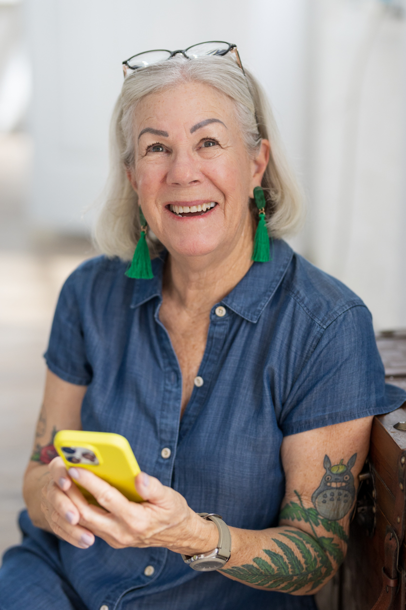 woman holding her phone