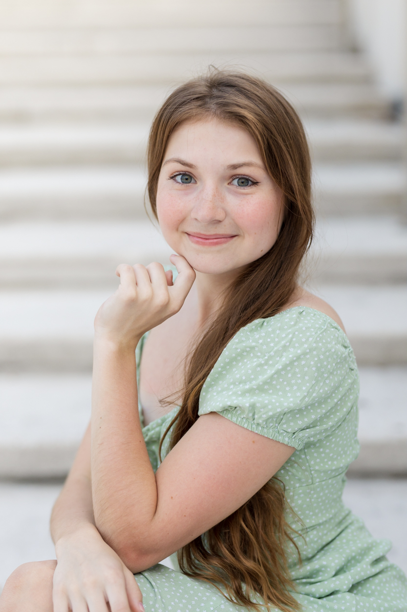woman posing on the steps