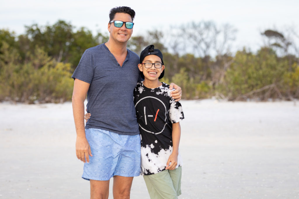 father and son casual at the beach