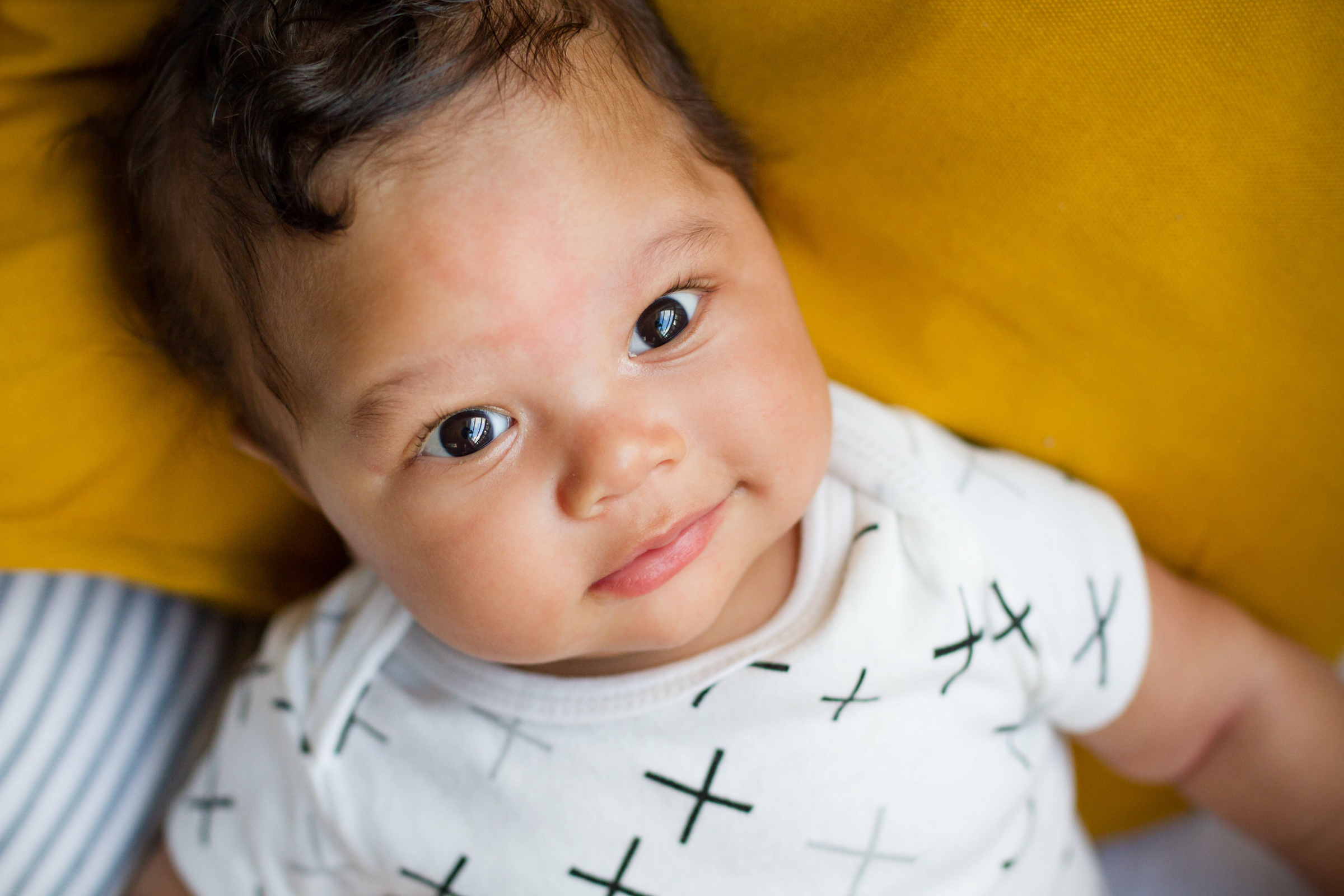 3 month old baby looking at camera