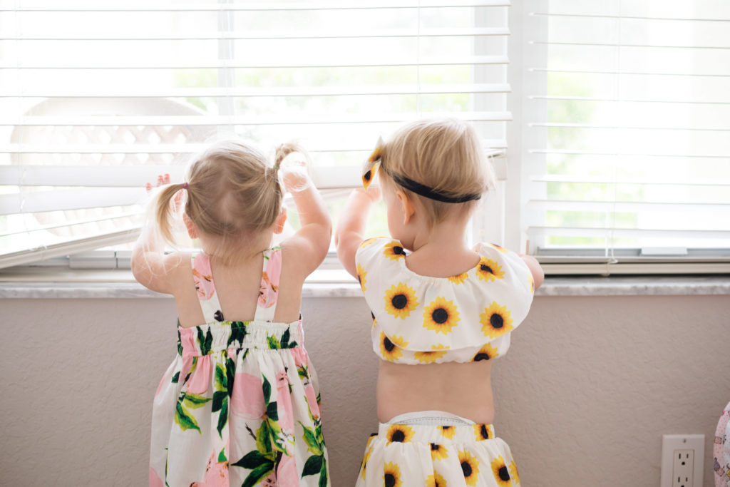babies looking out the window