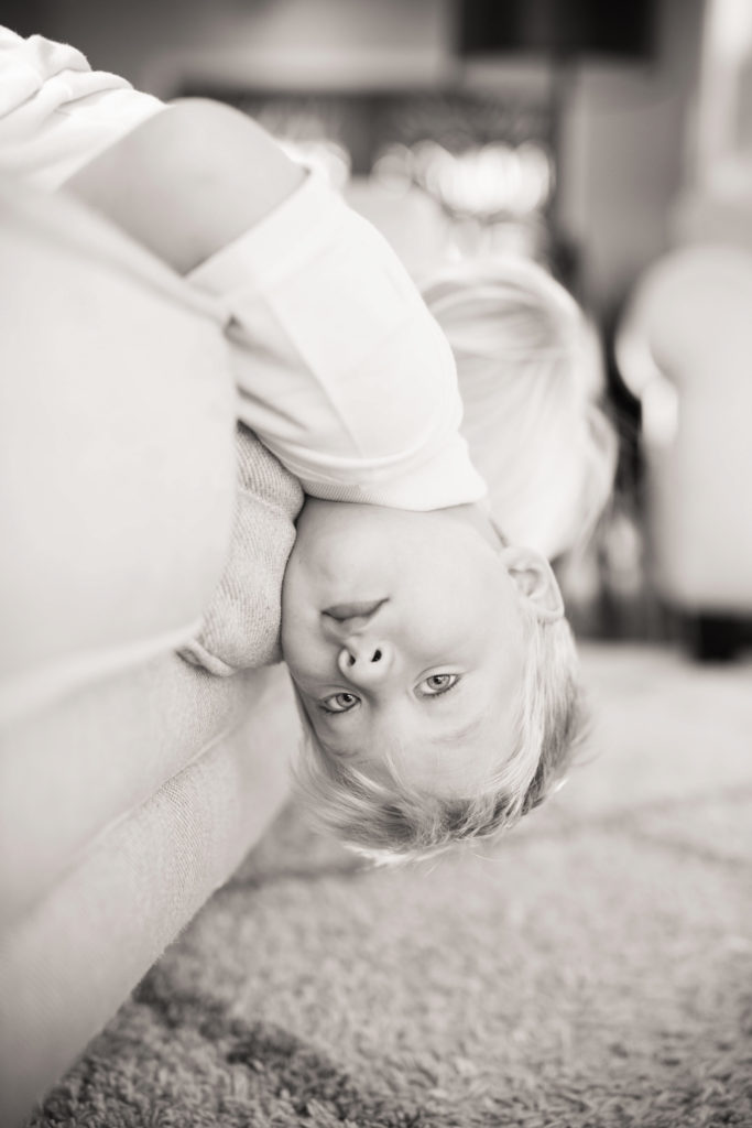 boy upside down on couch_