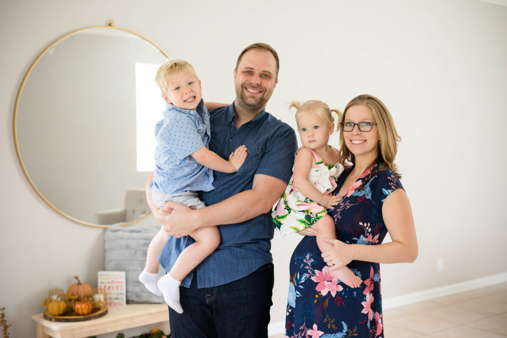 family maternity photo indoors