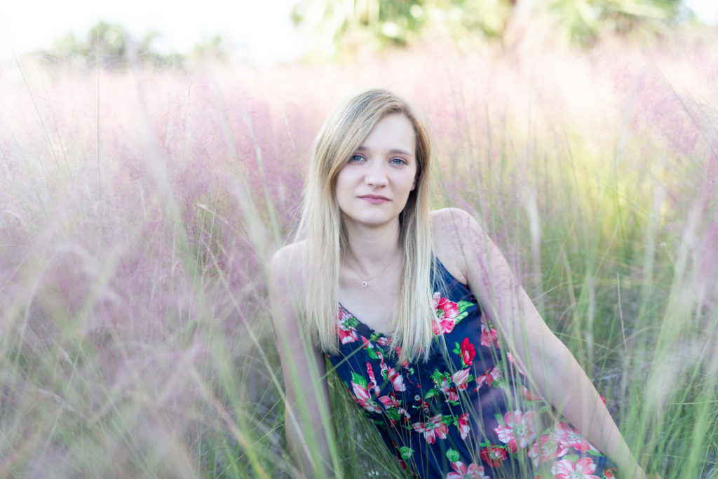 portrait in tall pink grass