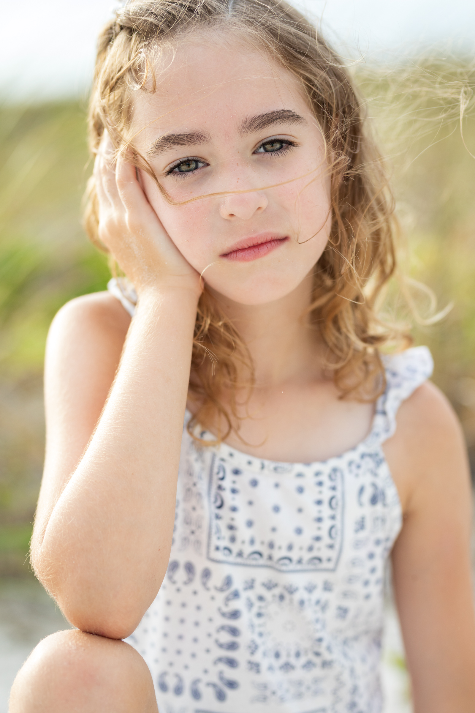 serious child at the beach
