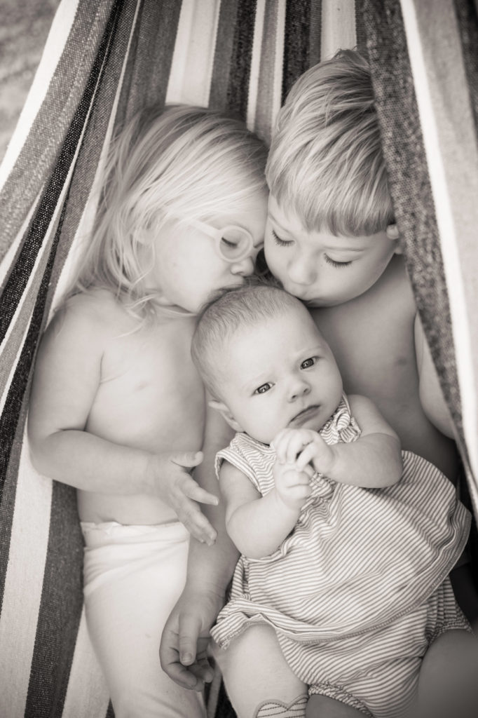 3 little kids in a hammock