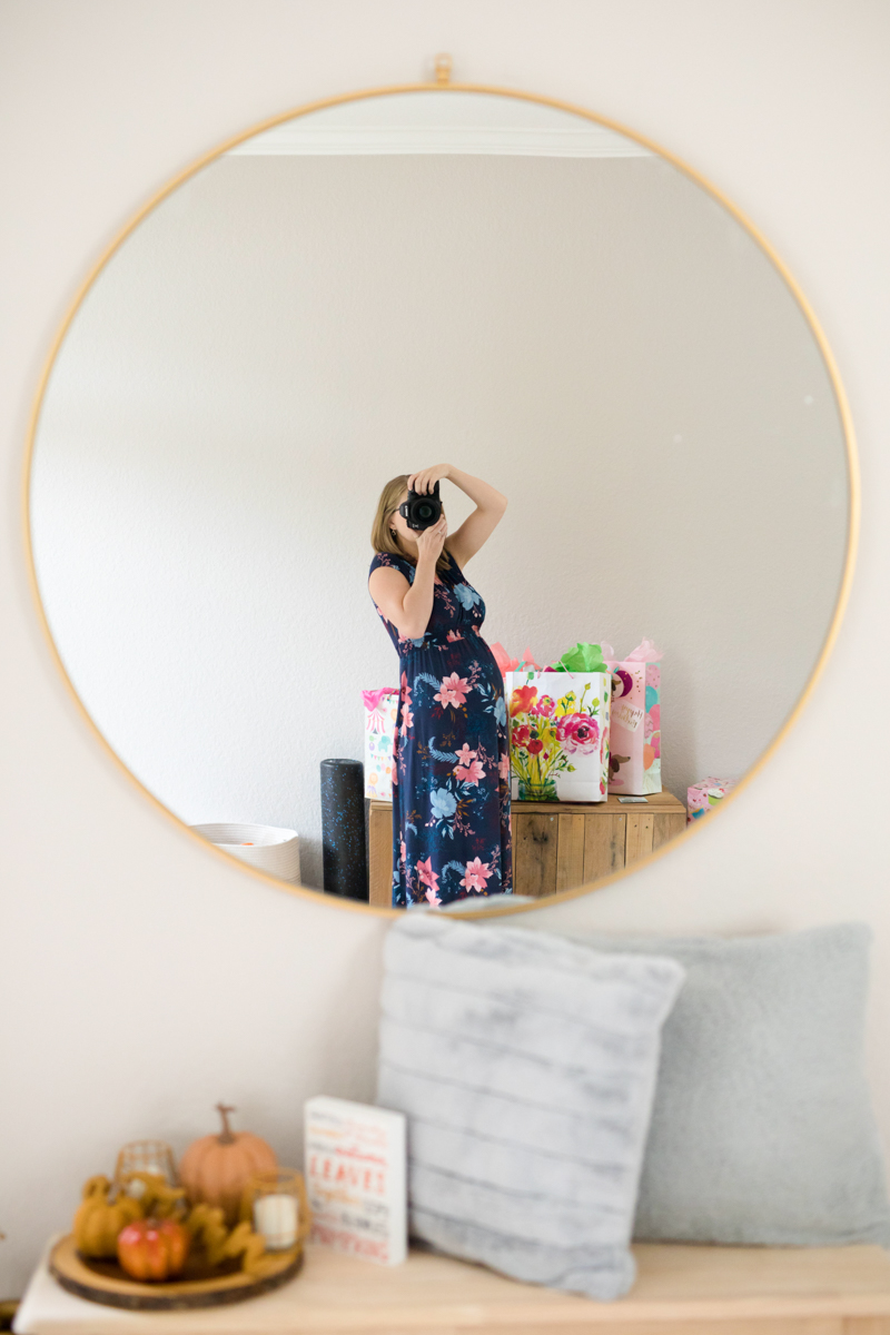 self portrait of maternity bump in a mirror