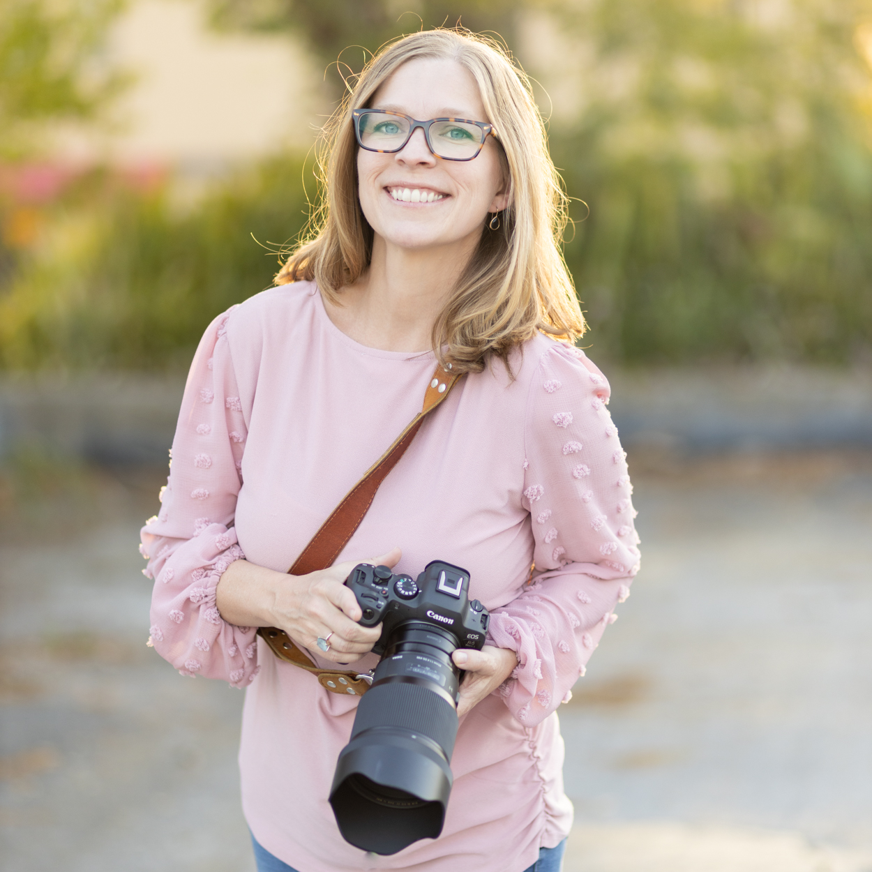 photographer holding camera