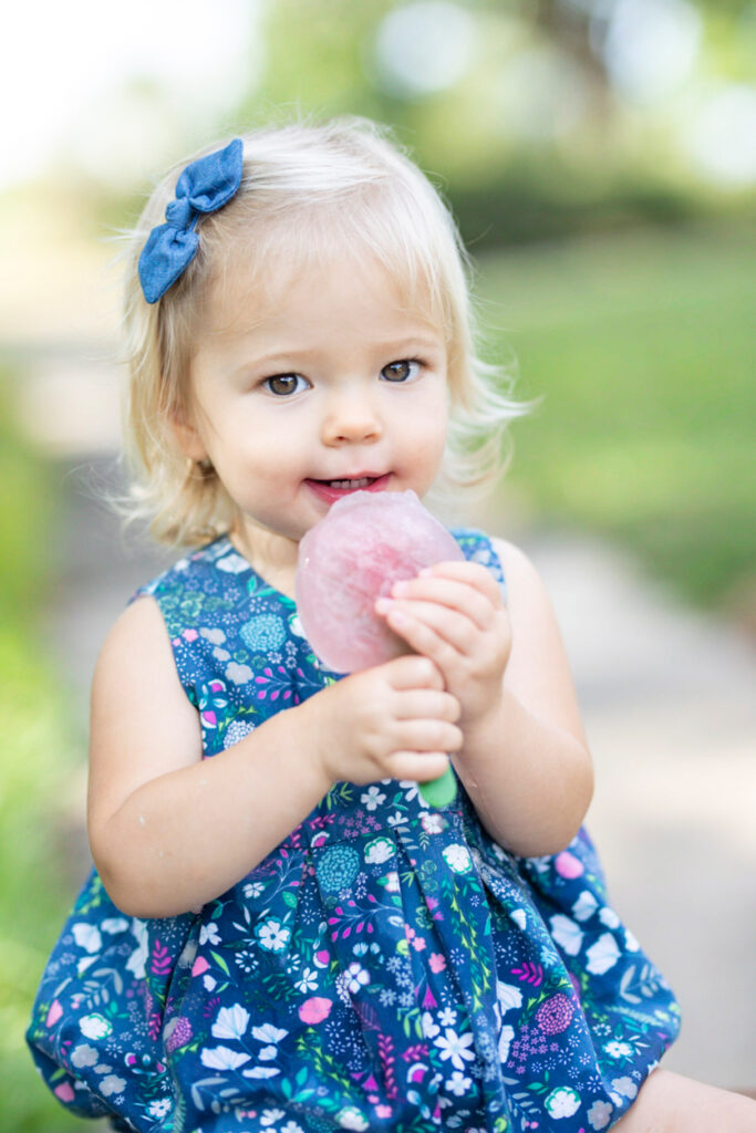 best family photographer in palm harbor cute baby model with a popsicle