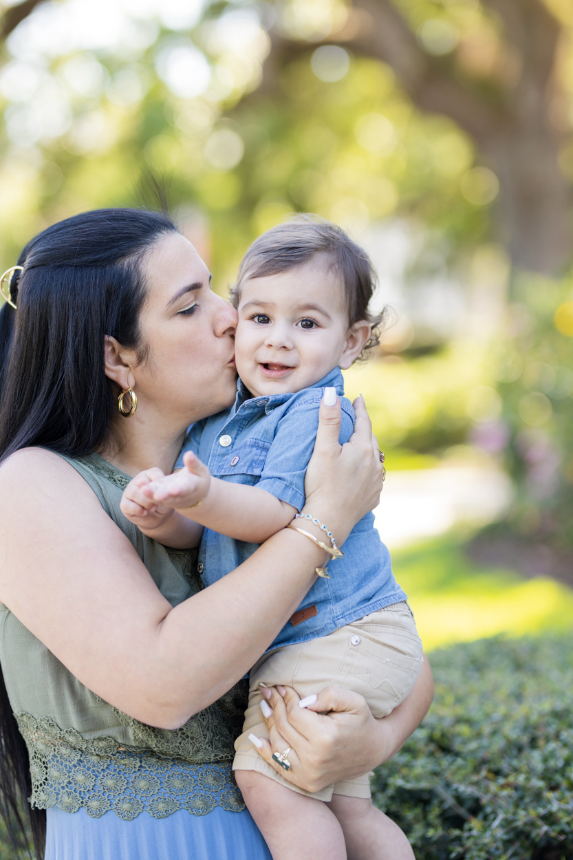 mom kissing her baby boy