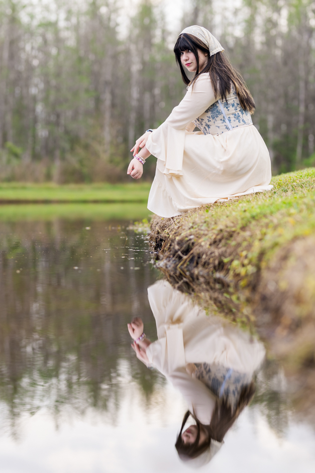 girl and her lake reflection