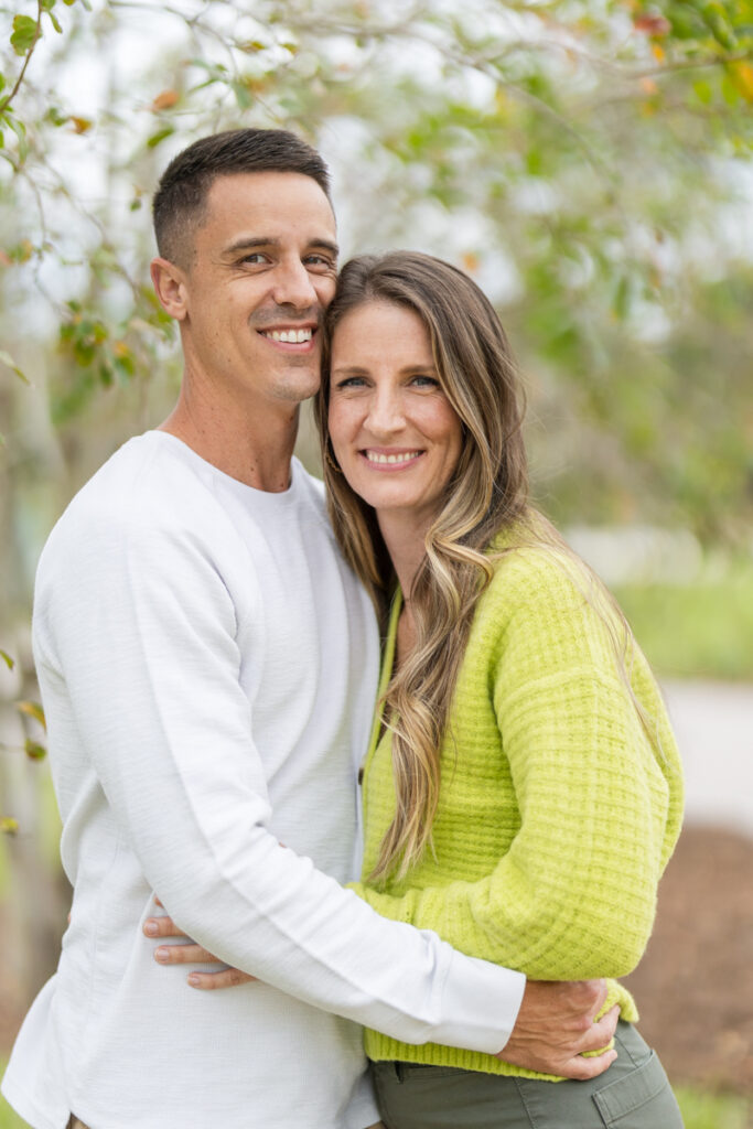 couple posing for photos in spring