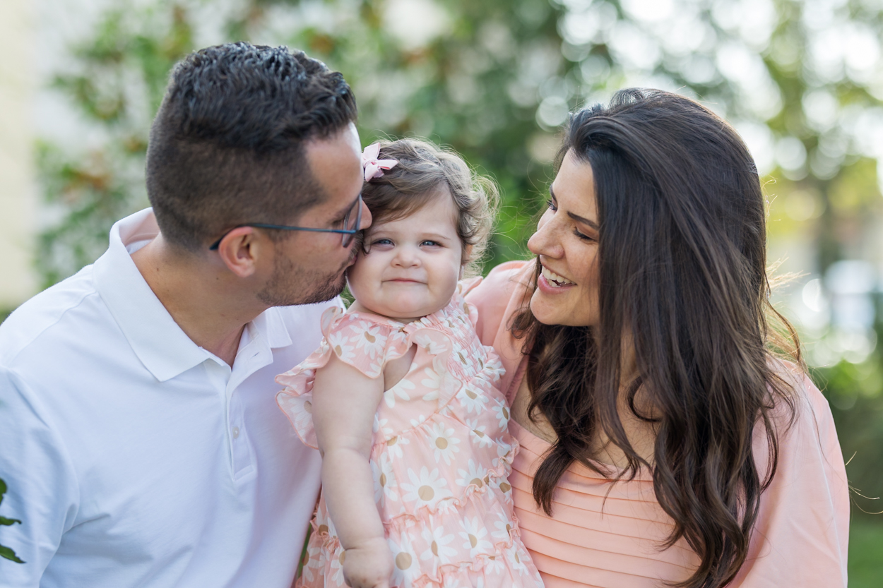 family of 3 posing for photos