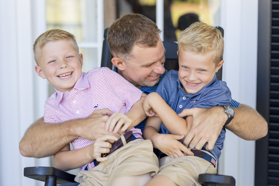 tampa bay family photos dad tickling his sons