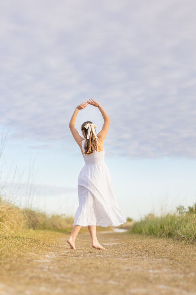 girl dancing at the beach