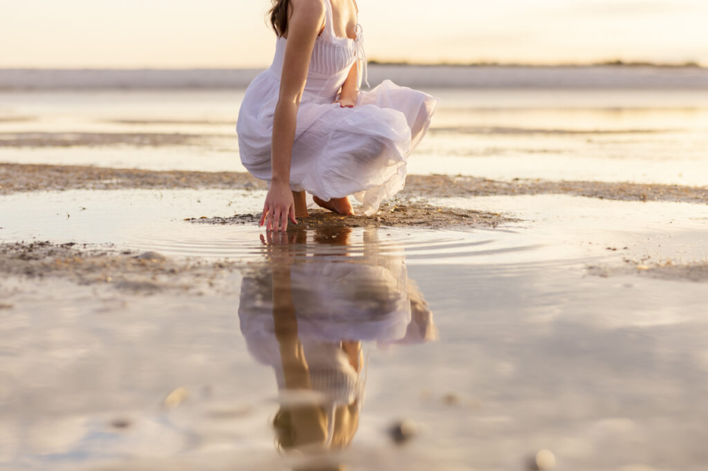 girl causing a ripple in the water
