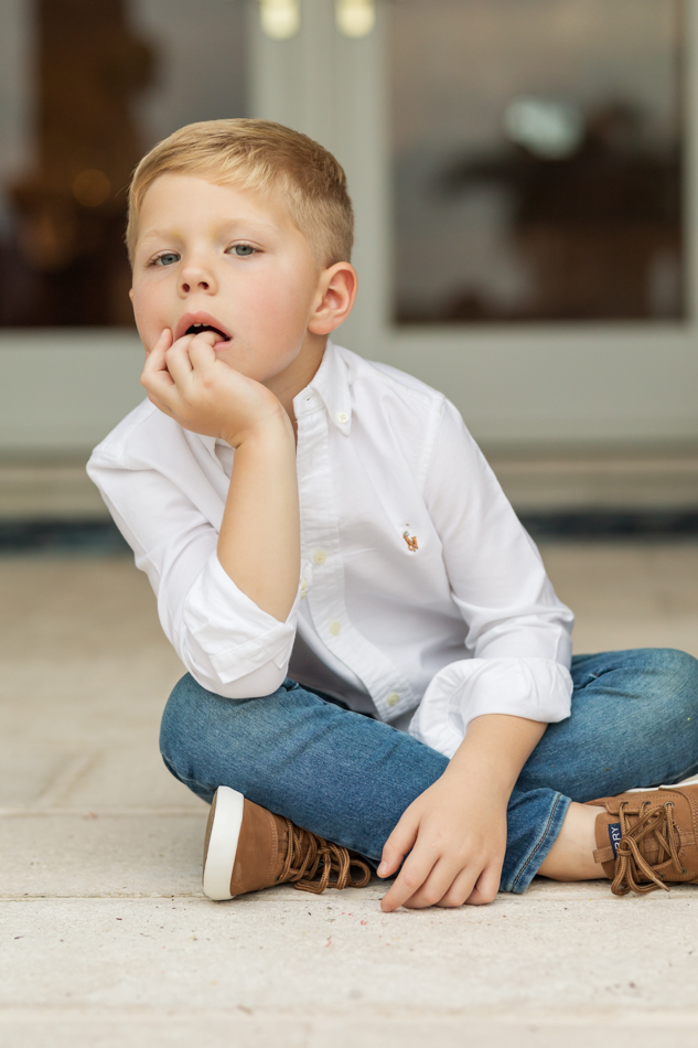 boy looking board at the camera