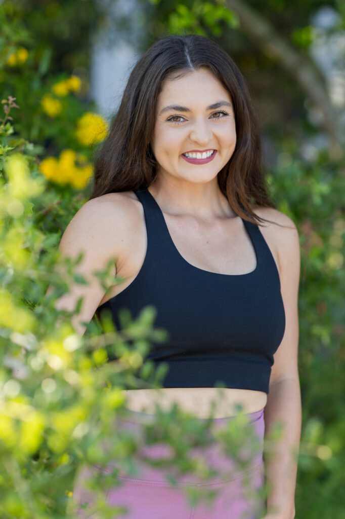 girl in work out clothes with foliage background
