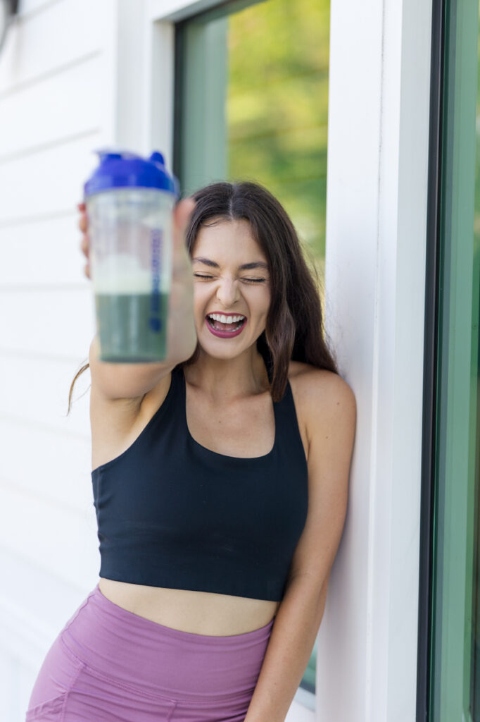 health coach with green smoothie