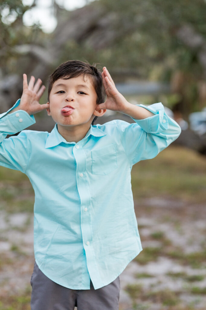 boy making silly face at camera