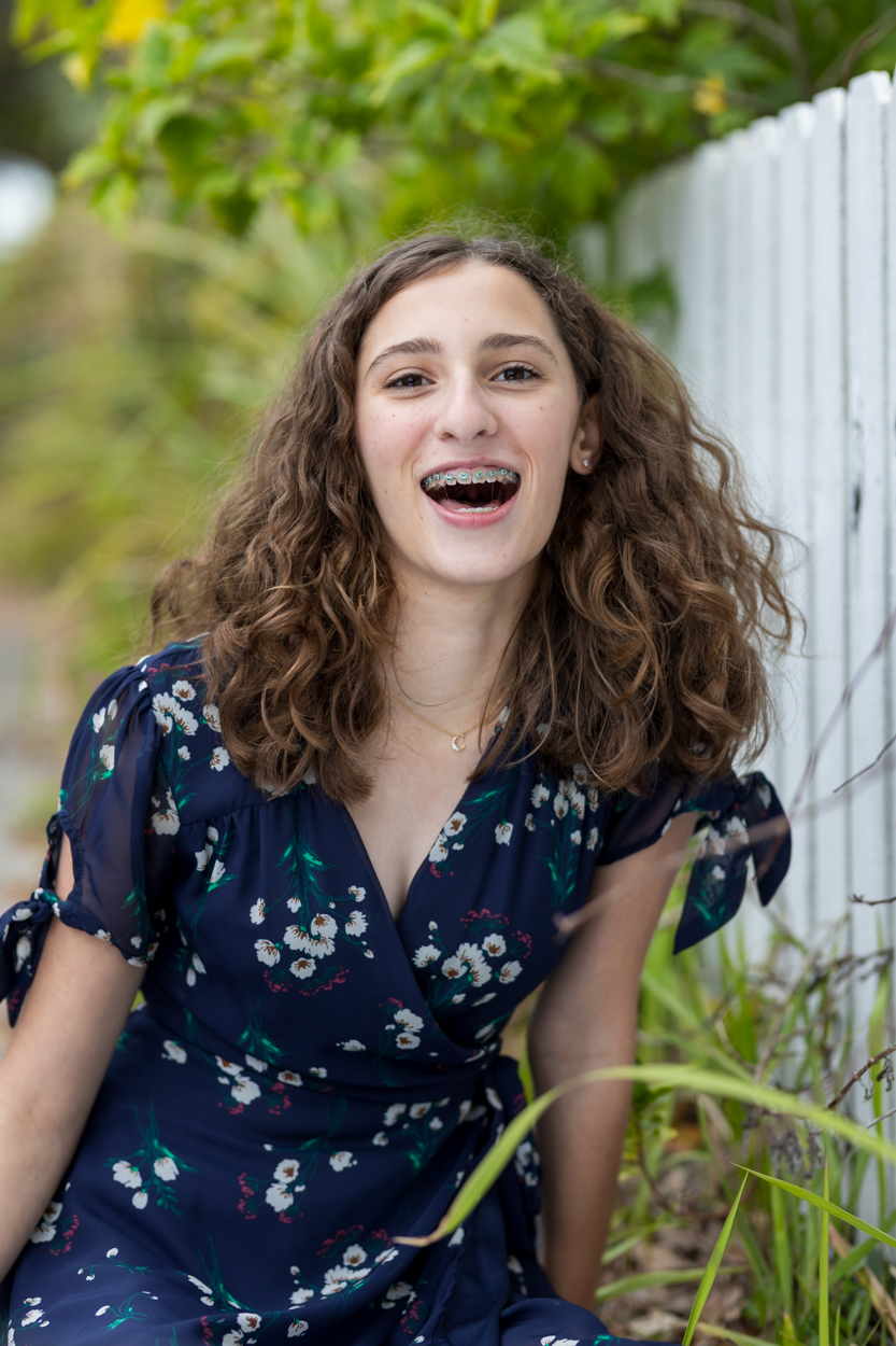 girl laughing at camera