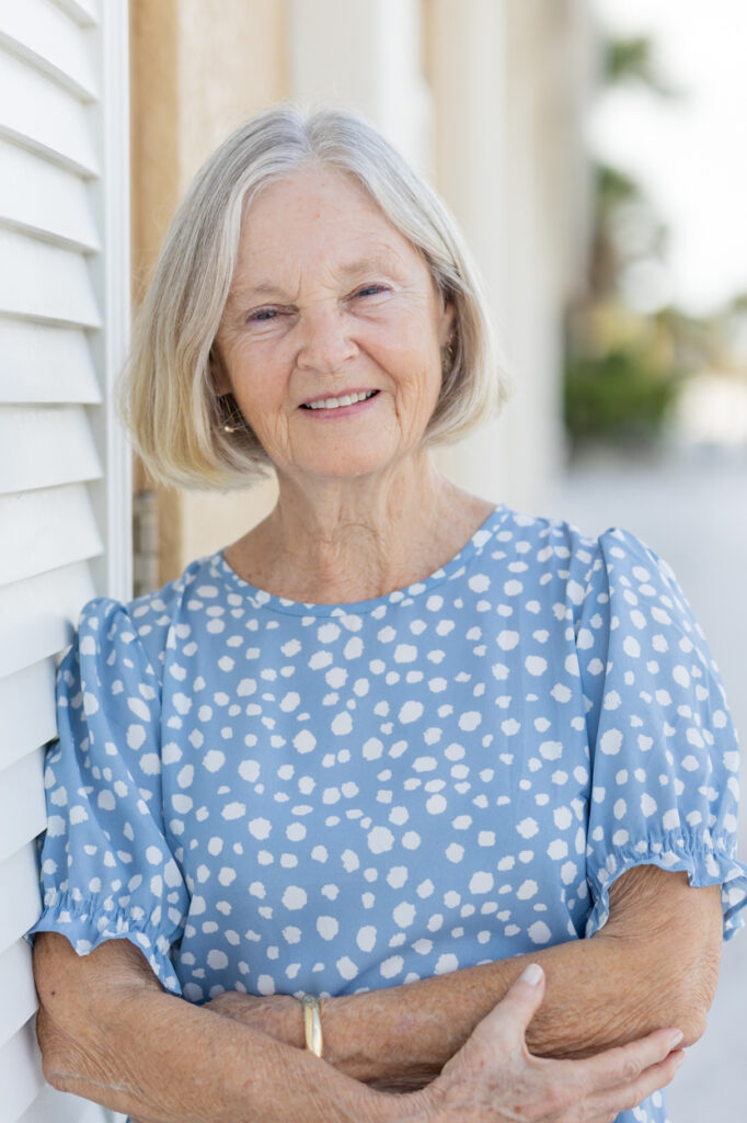 headshot of woman at the beach