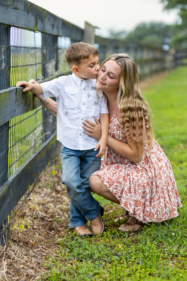 son kissing mom's cheek