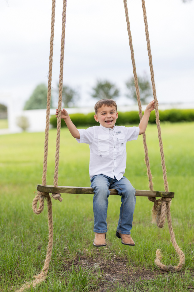 boy in tree swing
