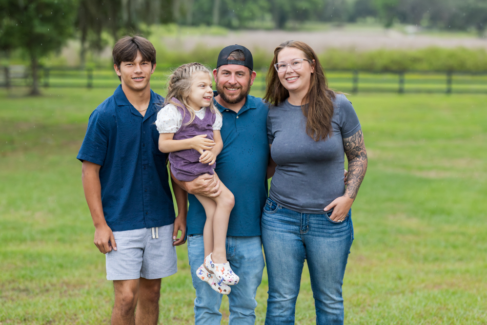 family photos fence in background