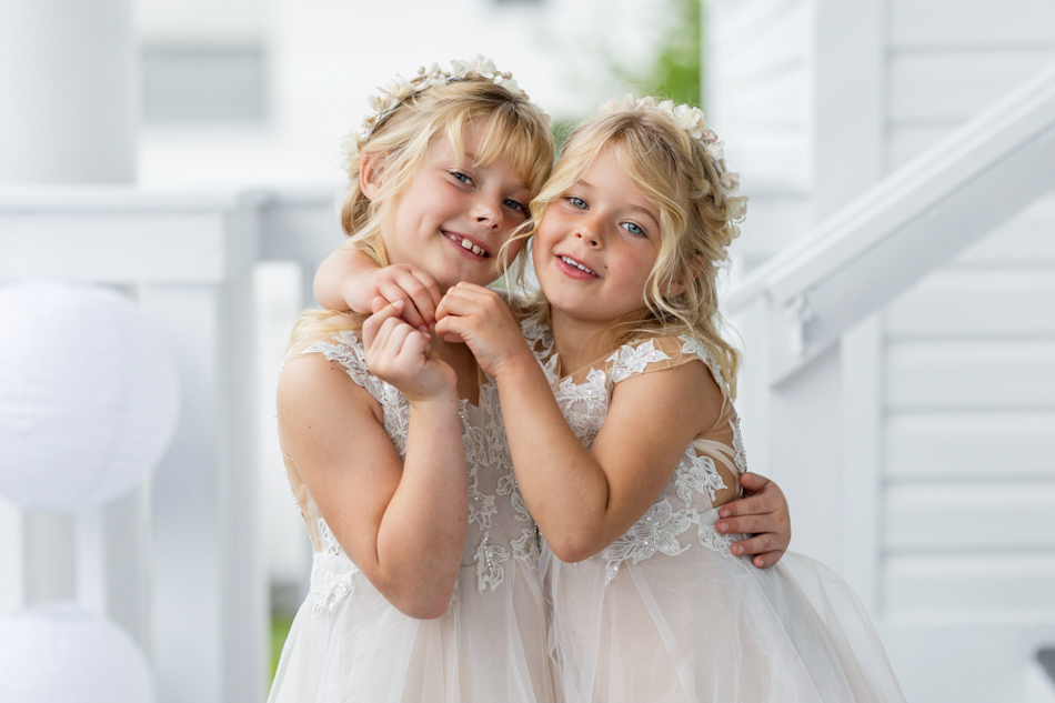 girls dressed up hugging