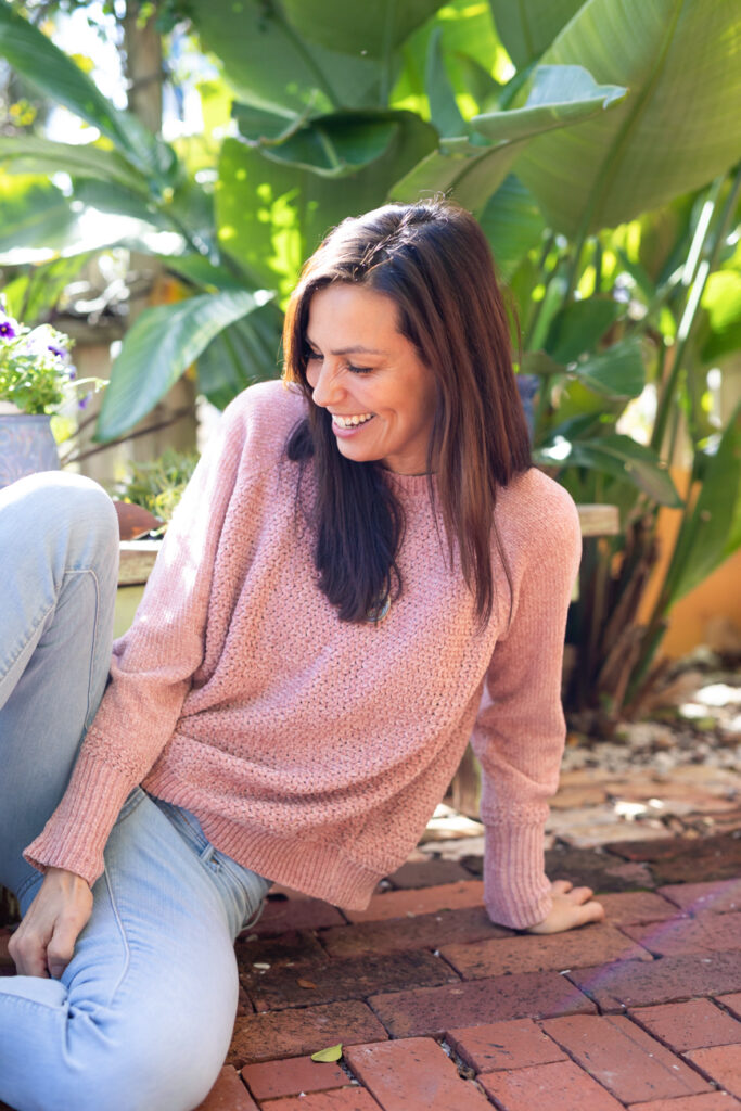 girl in pink sweater