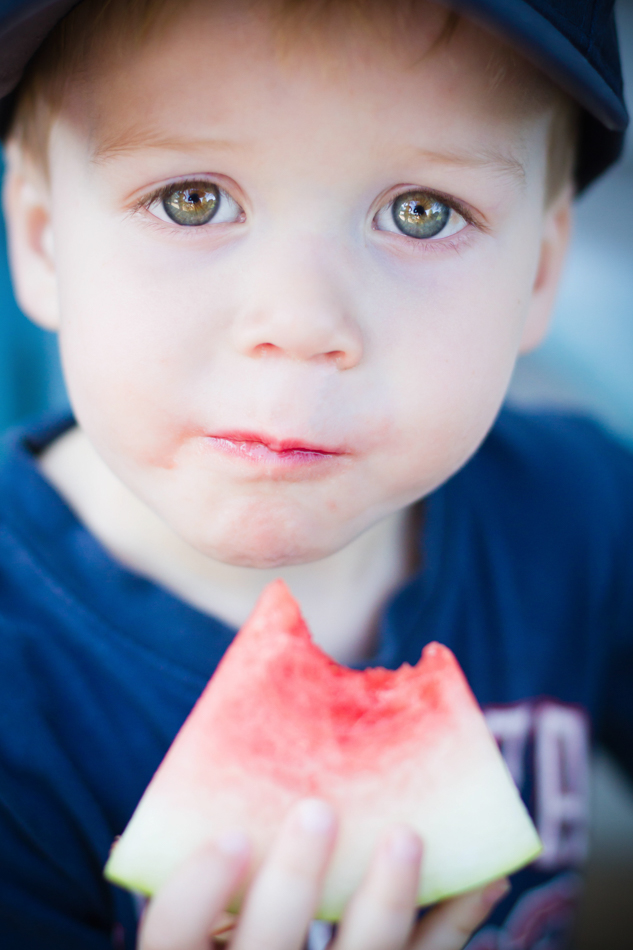 boy eating watermelon