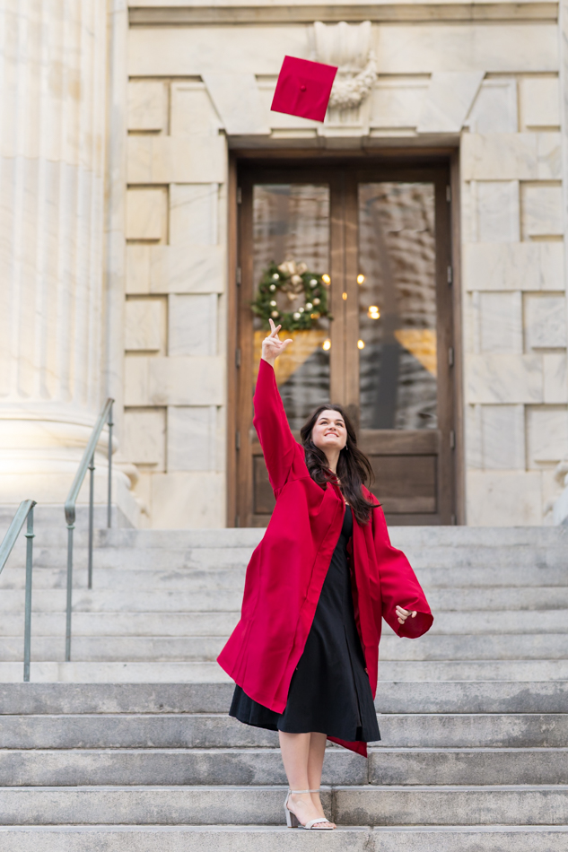 throwing graduation cap up in the air