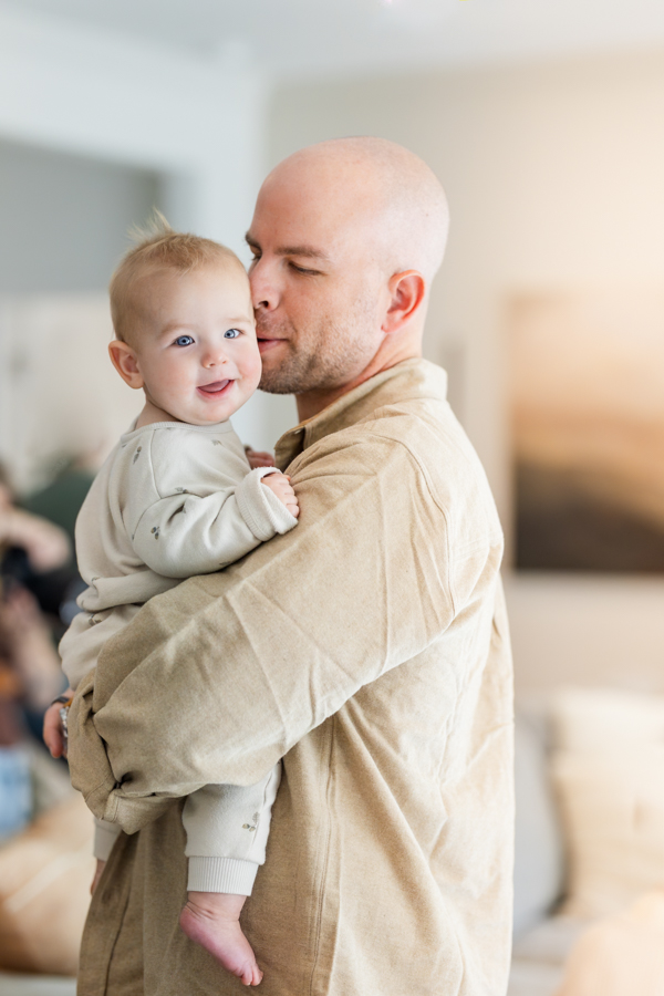 Dad and baby in home photoshoot tampa